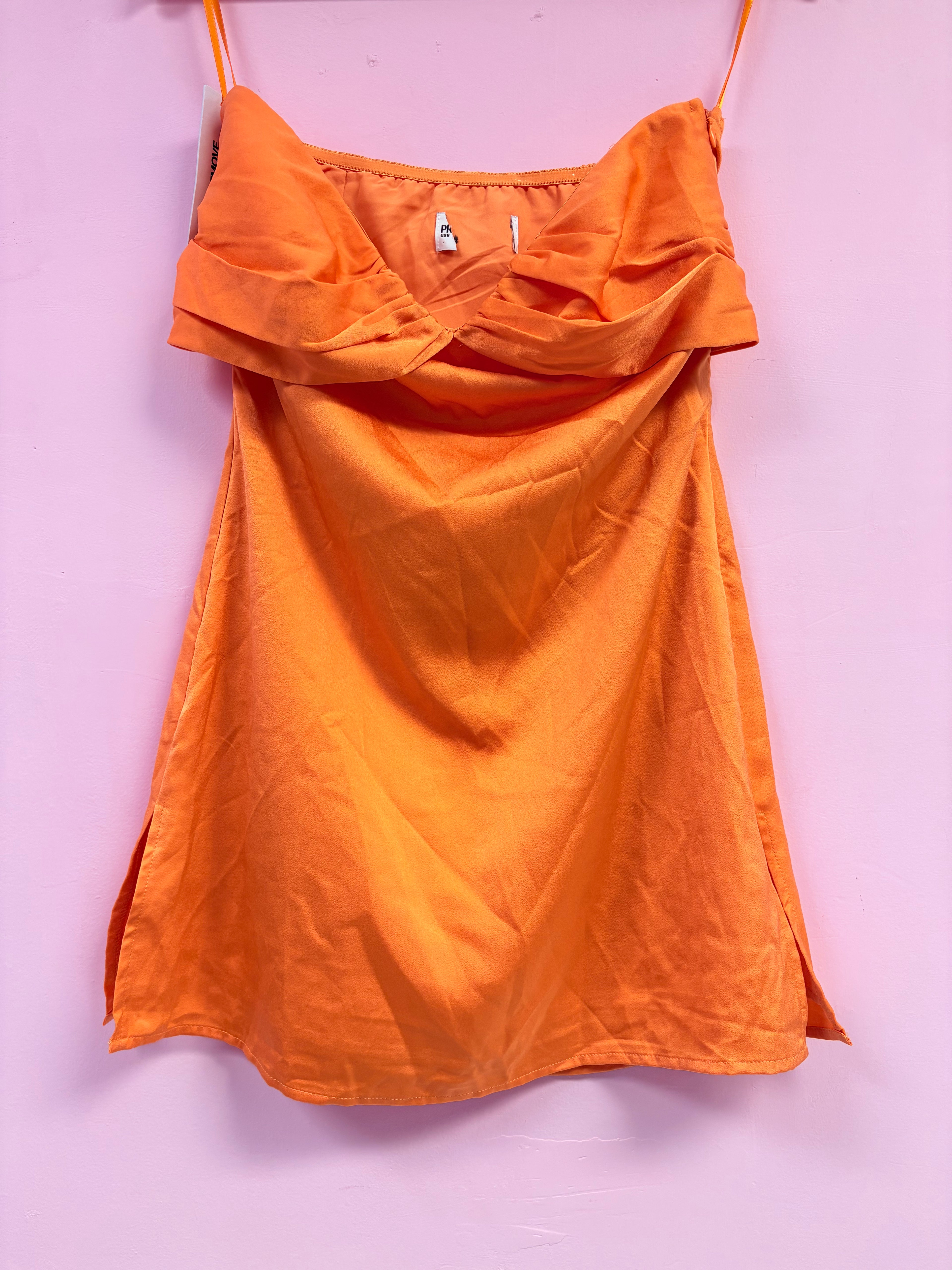 irena strapless mini dress Purple Mini dresses Gathers at the bust give a little texture to this slinky satin minidress made in a strapless silhouette with silicone along the neck to keep it from slipping. Princess Polly - Irena Strapless